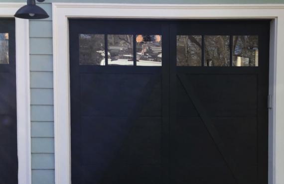 cool black garage door with 3-pane square windows